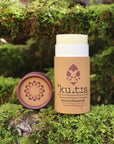 solid natural deodorant stick in a cardboard tube