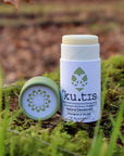 solid natural deodorant stick in a cardboard tube