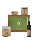 Gift box containing  uplifting body butter, lime lip balm, restorative serum and detox washing grains made by Kutis Skincare. 